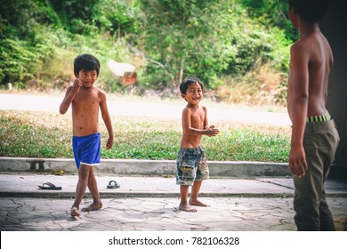 Sihanoukville, Cambodia - January 18, 2015: Cambodian kids play in slum village near Otres Beach in Sihanoukville, Cambodia
