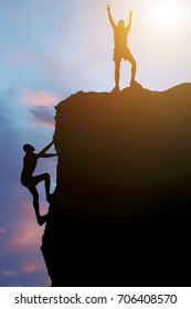 Sihouette businessman climbs a mountain , one man success.Business concept. - Shutterstock ID 706408570