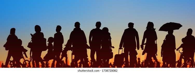 sihouette of group of people sunset sky background