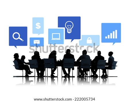 Sihouettes of Business People in a Meeting with Business Symbols