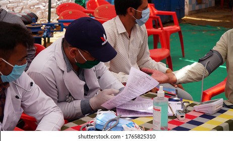 Sikar, Rajasthan, India - June 28, 2020: Doctor Checking Blood Pressure On Blood Donation Camp, Donation To Support During Coronavirus