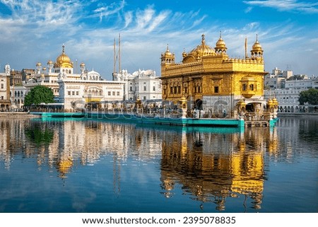 Sikh gurdwara Golden Temple (Harmandir Sahib) and water tank. Holy place of Sikihism. Amritsar, Punjab, India