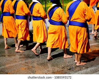 Sikh Soldiers With Swords Walk Barefoot