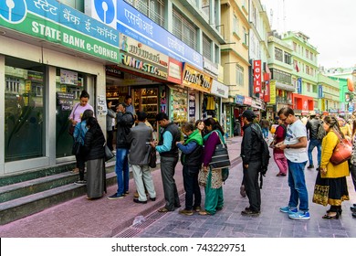 SIKKIM, INDIA - MAR 13, 2017: Unidentified Indian Group Of People Stand In A Queue To The State Bank.