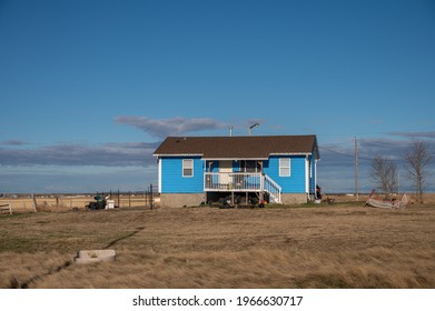 Siksika Nation, Alberta - May 2, 2021: House on the Siksika Nation reservation in Alberta. Housing is a concerning issue for many First Nations people ion the Canadian prairies. 