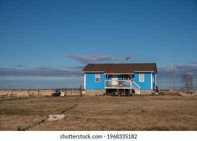 Siksika Nation, Alberta - May 2, 2021: House On The Siksika Nation Reservation In Alberta. Housing Is A Concerning Issue For Many First Nations People Ion The Canadian Prairies. 