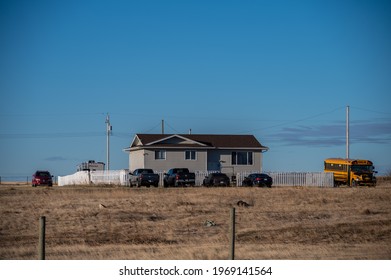 Siksika Nation, Alberta - May 2, 2021: House on the Siksika Nation reservation in Alberta. Housing is a concerning issue for many First Nations people ion the Canadian prairies. 