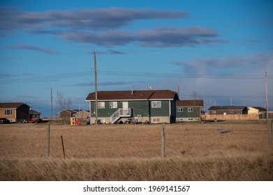 Siksika Nation, Alberta - May 2, 2021: House On The Siksika Nation Reservation In Alberta. Housing Is A Concerning Issue For Many First Nations People Ion The Canadian Prairies. 