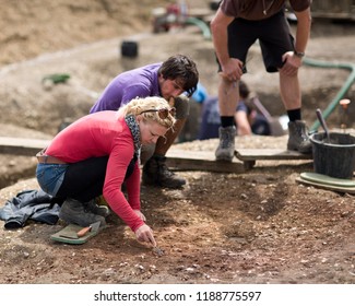 Silchester, Hampshire, England - August 5 2012 : Archaeologists excavating (digging) Roman town of Calleva Atrebatum - Shutterstock ID 1188775597