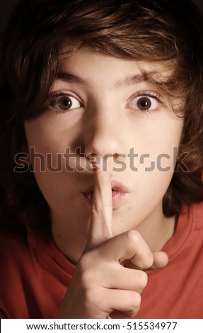 silence gesture, boy ask for keep important secret from others, mystery