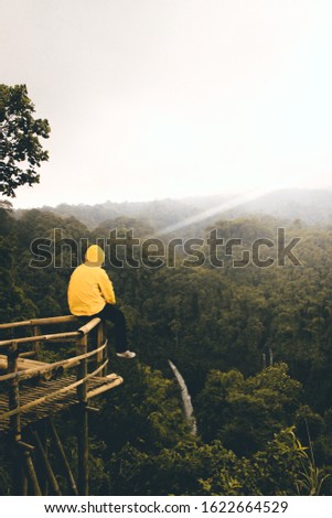 silence sitting above the height of the waterfall waterfall Ciparay waterfall Tasikmalaya Indonesia