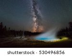 Silex Spring, Yellowstone National Park under the night sky. 