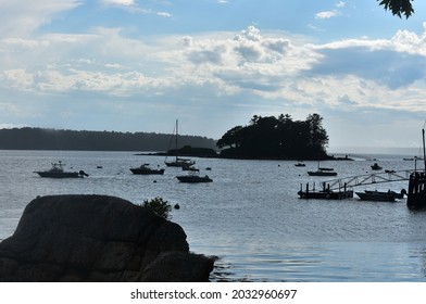 Silhoeutted Boats And Islands In Casco Bay Maine.