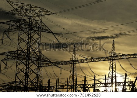 Silhoueet. Electrical tower and backgrounds yellow sky.