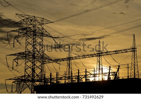 Silhoueet. Electrical tower and backgrounds yellow sky.