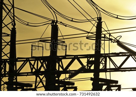 Silhoueet. Electrical tower and backgrounds yellow sky.