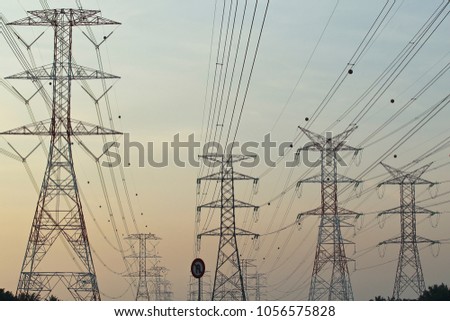 Silhoueet. Electrical tower at open sky.