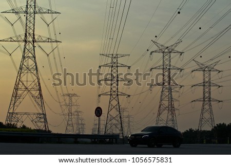 Silhoueet. Electrical tower at open sky.