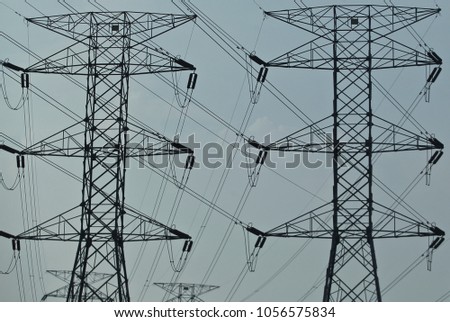 Silhoueet. Electrical tower at open sky.