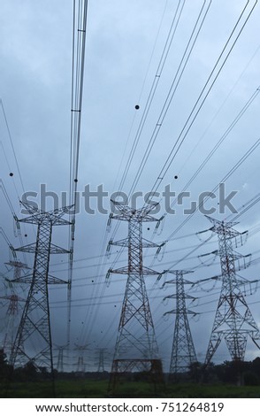 Silhoueet. Electrical tower at open sky.