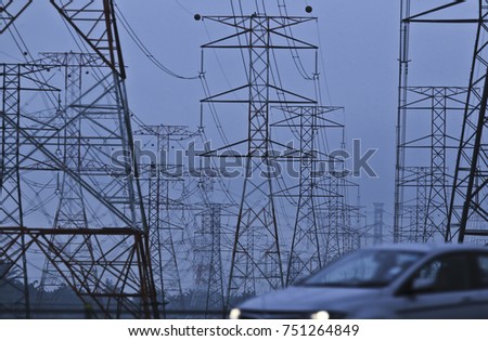 Silhoueet. Electrical tower at open sky.