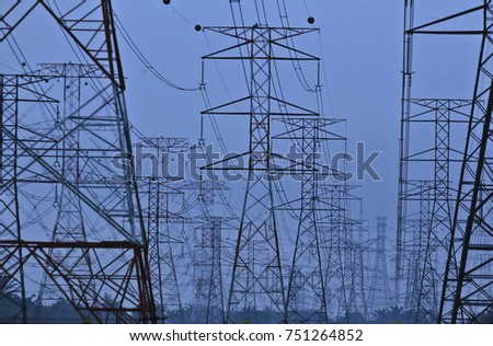 Silhoueet. Electrical tower at open sky.
