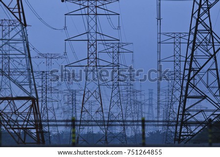 Silhoueet. Electrical tower at open sky.