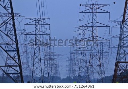 Silhoueet. Electrical tower at open sky.