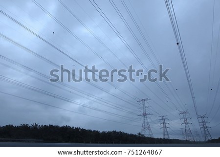 Silhoueet. Electrical tower at open sky.
