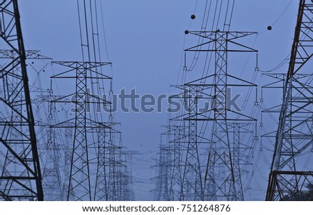 Silhoueet. Electrical tower at open sky.