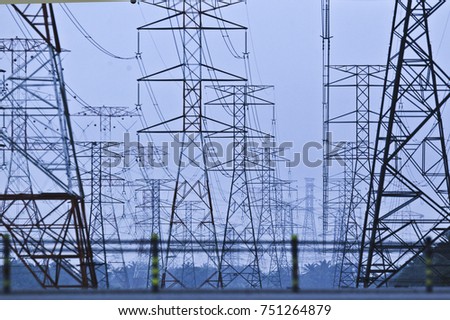 Silhoueet. Electrical tower at open sky.