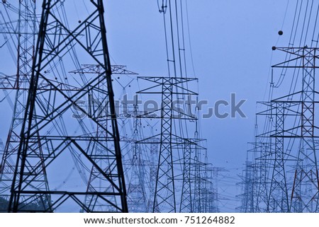 Silhoueet. Electrical tower at open sky.