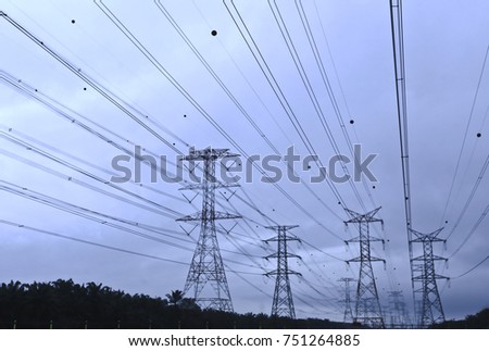 Silhoueet. Electrical tower at open sky.