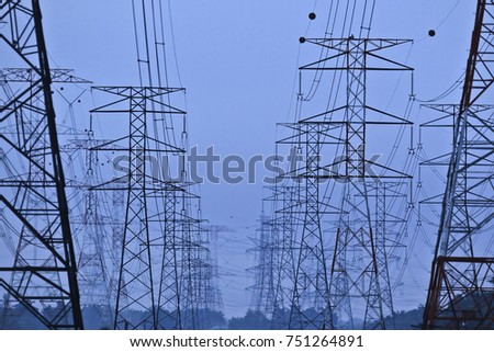 Silhoueet. Electrical tower at open sky.