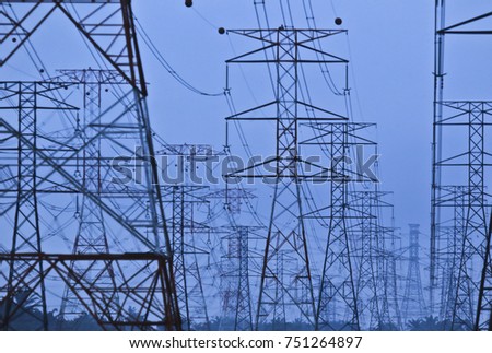 Silhoueet. Electrical tower at open sky.