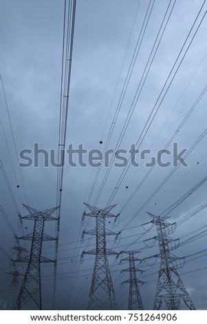 Silhoueet. Electrical tower at open sky.