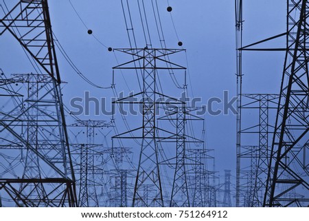 Silhoueet. Electrical tower at open sky.