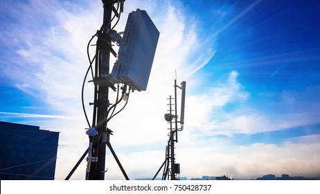 Silhouette Of 5G Smart Cellular Network Antenna Base Station On The Telecommunication Mast 