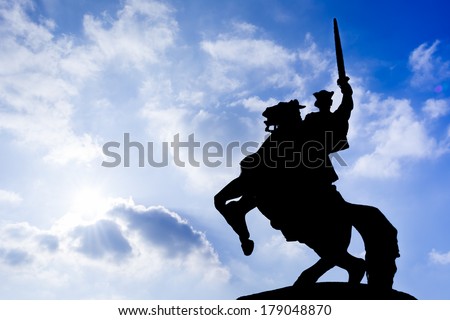 silhouette - The 7.8 metres tall Bronze statue of King Svatopluk, the greatest king of the Great Moravian Empire, astride his horse in front of Bratislava Castle. The statue was designed by Jan Kulich