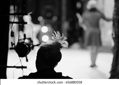 Silhouette Of The Actress In The Light Of The Spotlights On The Stage Of The Theater