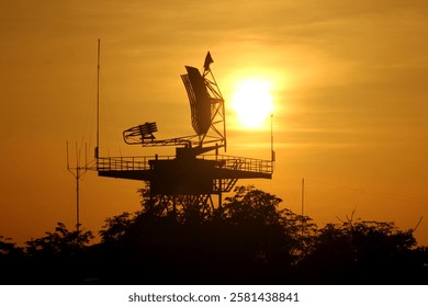Silhouette of an air flight radar at the airport