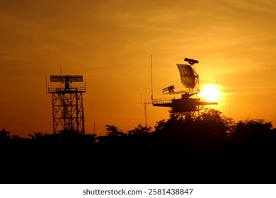 Silhouette of an air flight radar at the airport