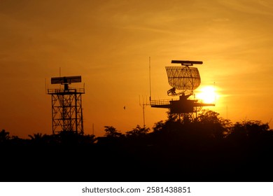 Silhouette of an air flight radar at the airport