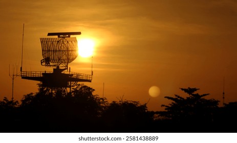 Silhouette of an air flight radar at the airport
