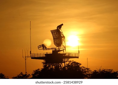 Silhouette of an air flight radar at the airport