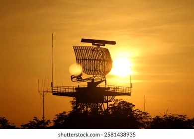 Silhouette of an air flight radar at the airport