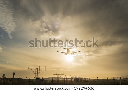 Similar – Flugzeug im Sonnenuntergang