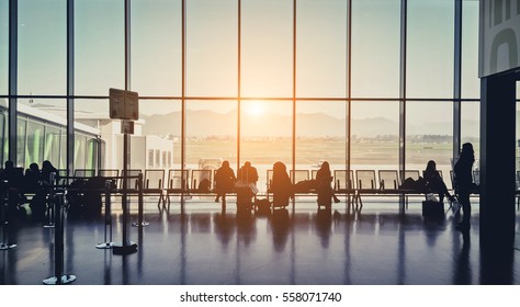 Silhouette of a airport at sunset