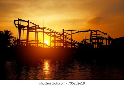Silhouette amusement in sunset