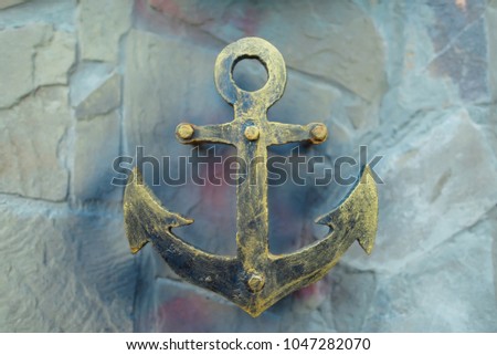 silhouette of anchors, carving from iron